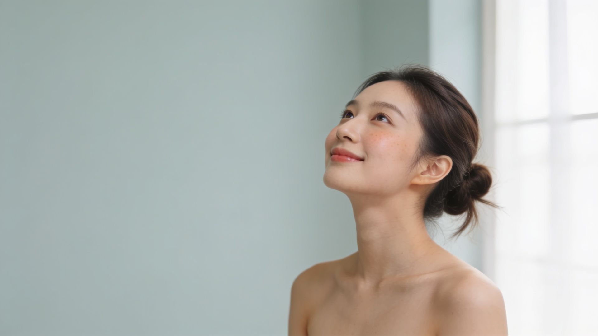 Young woman with fresh, clear skin, representing acne facials and medical acne treatment