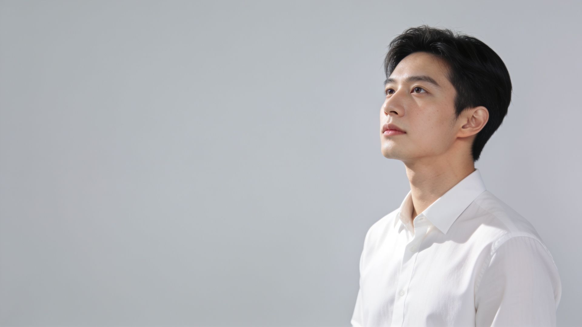 Young man with gently textured skin in a calm clinic setting, illustrating RF microneedling