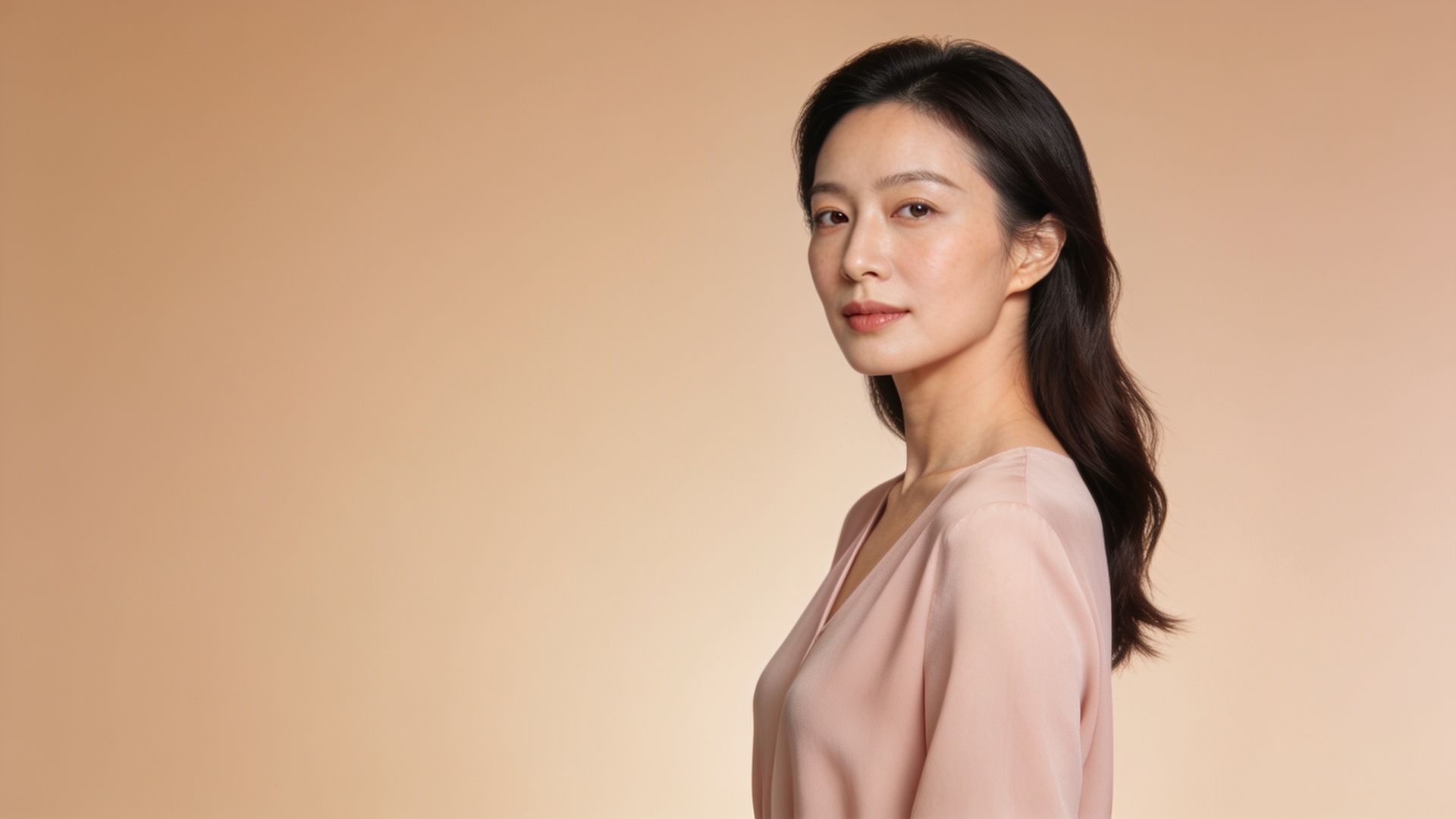 Woman in her mid thirties with luminous skin, illustrating gentle laser skin warming