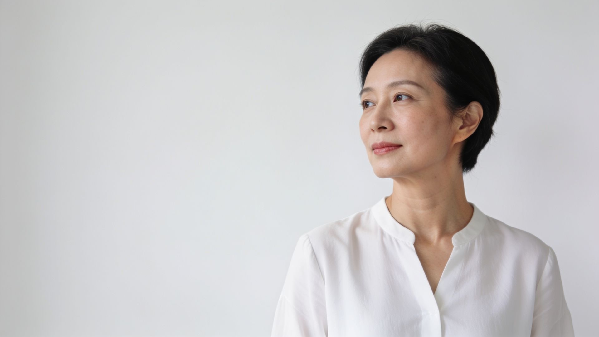 Woman showing natural skin on the neck and jaw, representing skin growth assessment